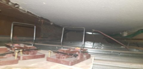 Dératisation dans un vide sanitaire et murs d'un logement pour des surmulots (rats) à Sainte-Savine