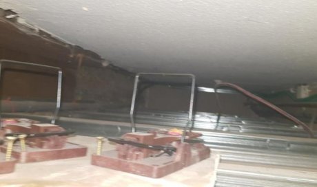 Dératisation dans un vide sanitaire et murs d'un logement pour des surmulots (rats) à Sainte-Savine